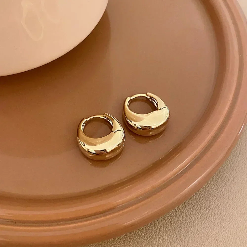 Argolas Grossas – Brilho Intenso em Aço Inoxidável