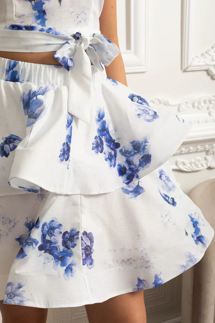 Conjunto – Top Estampado Sem Mangas + Saia Curta Plissada de Cintura Alta