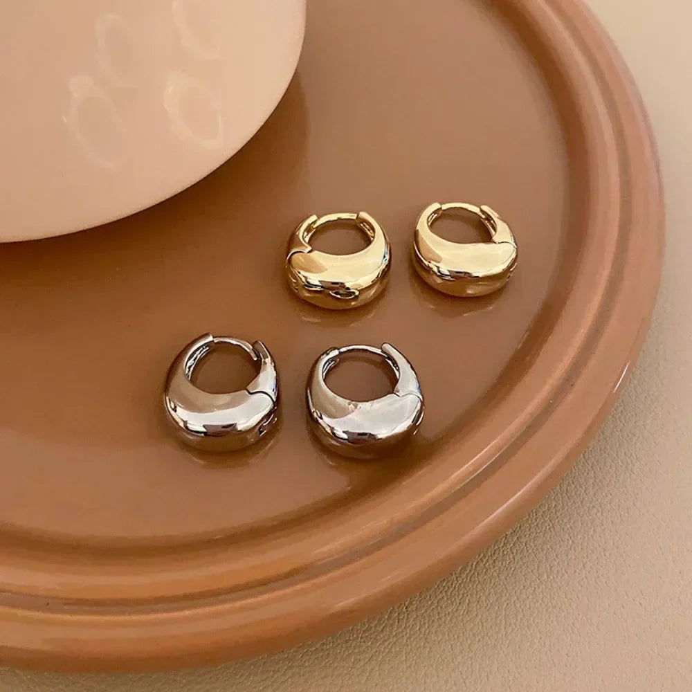 Argolas Grossas – Brilho Intenso em Aço Inoxidável