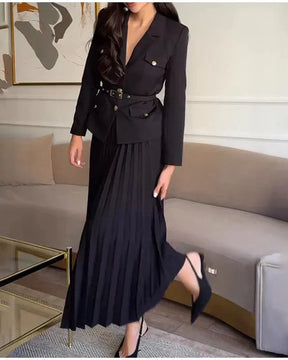 Conjunto Elegante com Casaco Alongado e Saia Plissada – Sofisticação em Dois Tempos