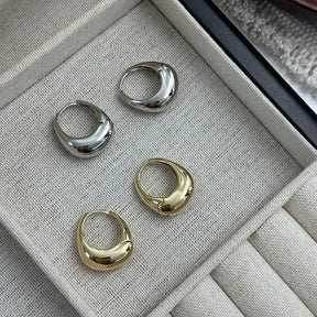Argolas Grossas – Brilho Intenso em Aço Inoxidável